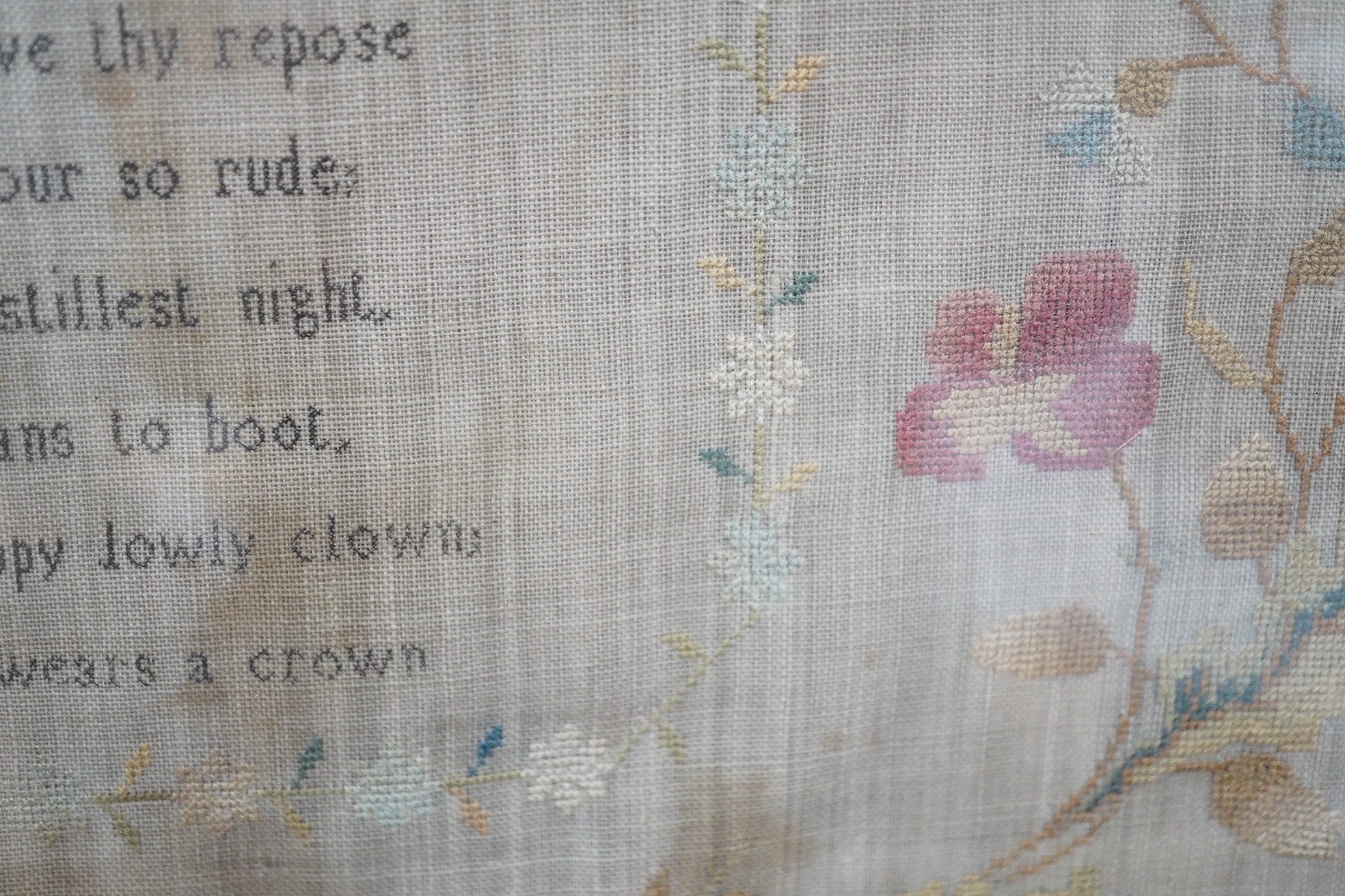 An early 19th century sampler dated 07, by Sarah Baker, ‘Henry IV’s Soliloquy of Sleep’, together with a later smaller alphabet and spot motif sampler by Elizabeth Fleet aged 8, dated 1838, both framed